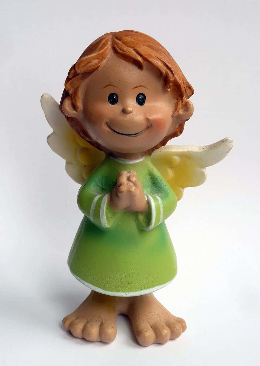 Cute Angel Figurine In A Green Dress