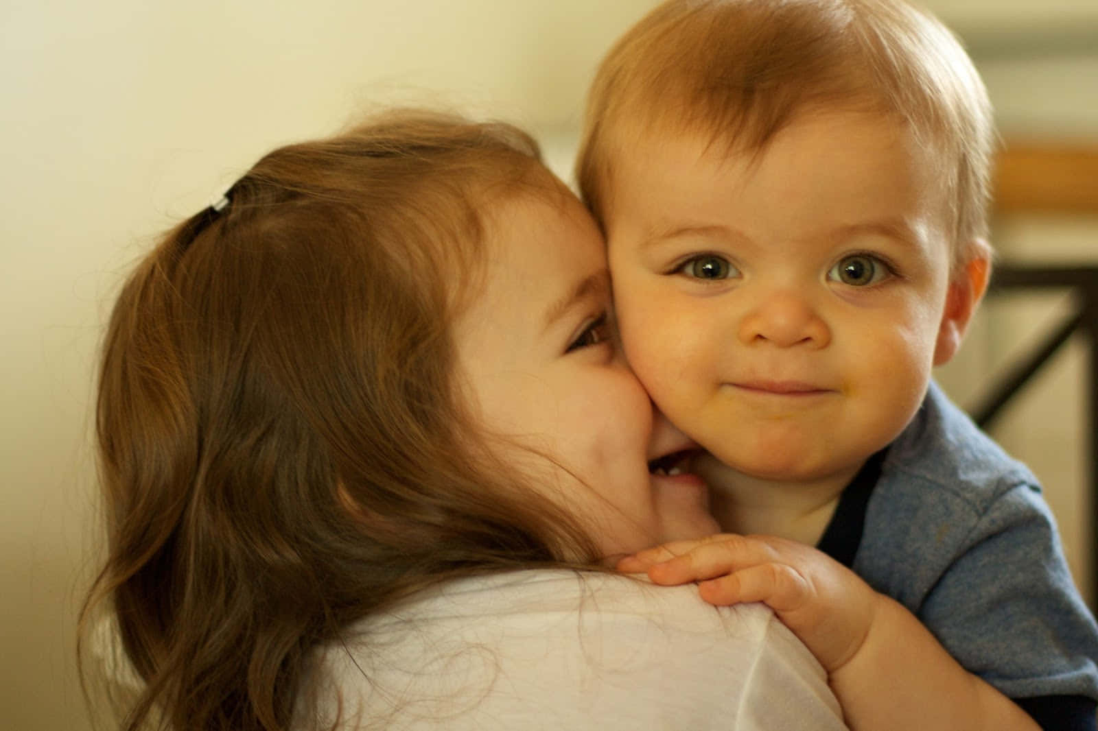 Cute Baby Couple Hugging Background