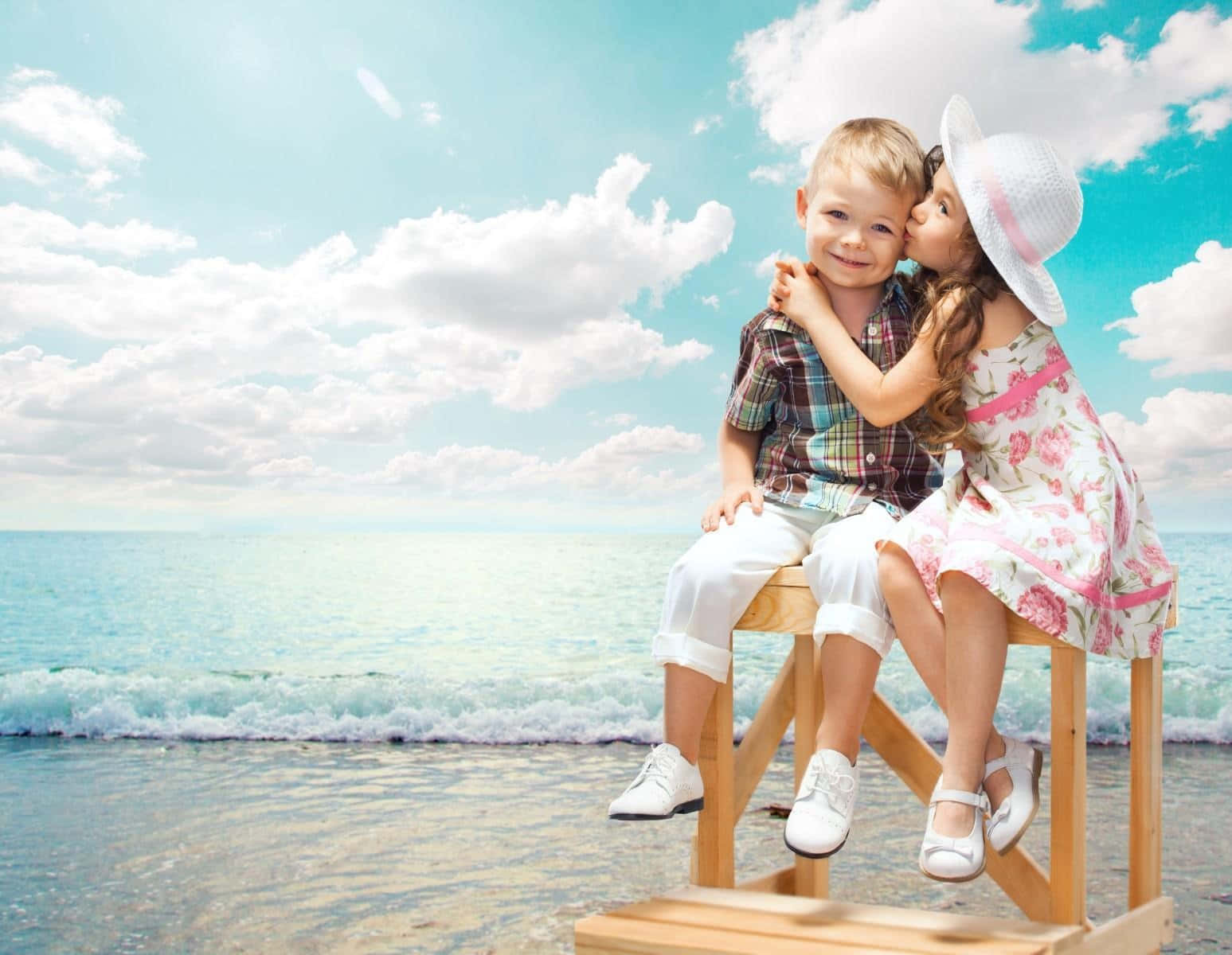 Cute Baby Couple On The Sea Background