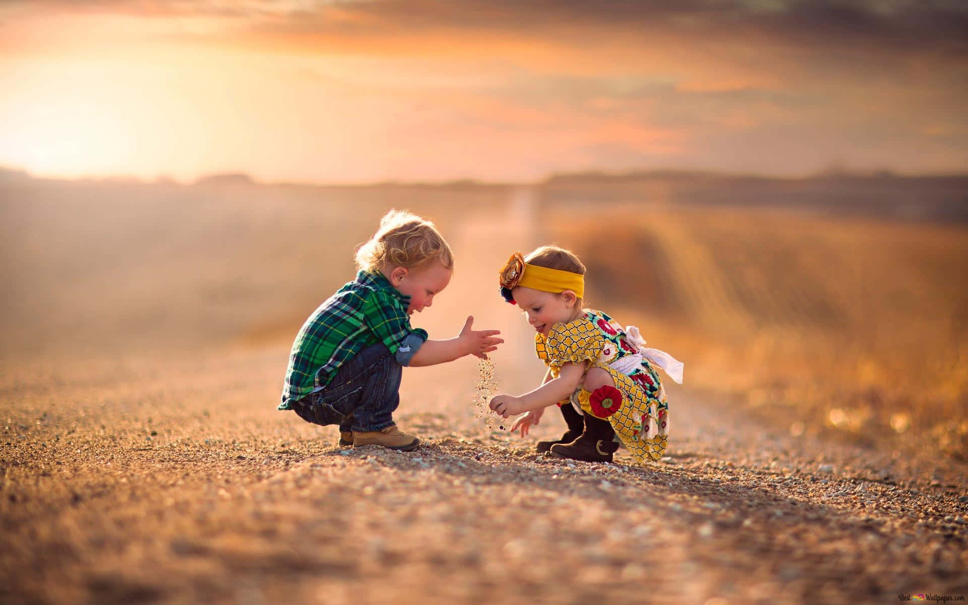 Cute Baby Couple Playing Sand Background