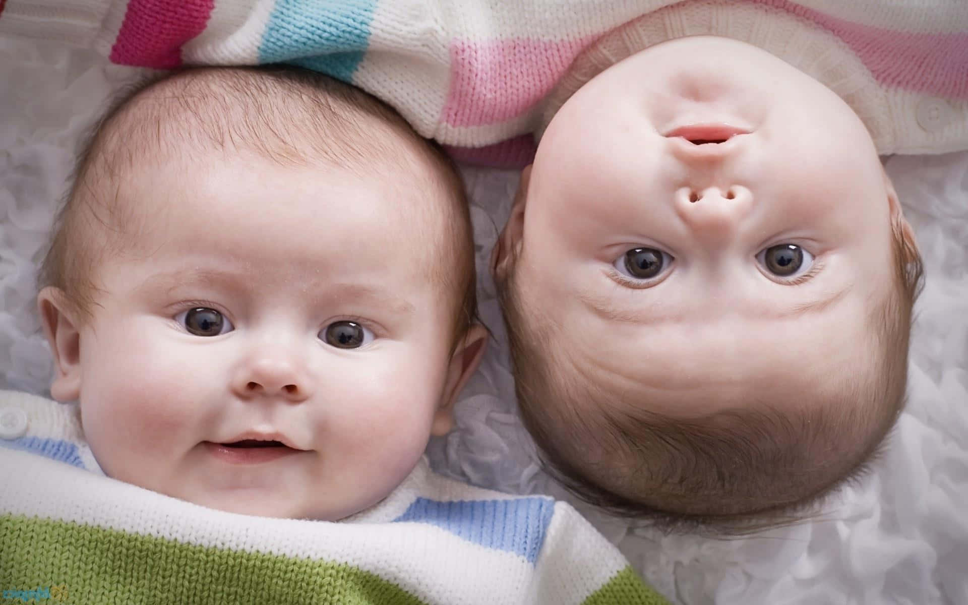 Cute Baby Couple Upside Down Background