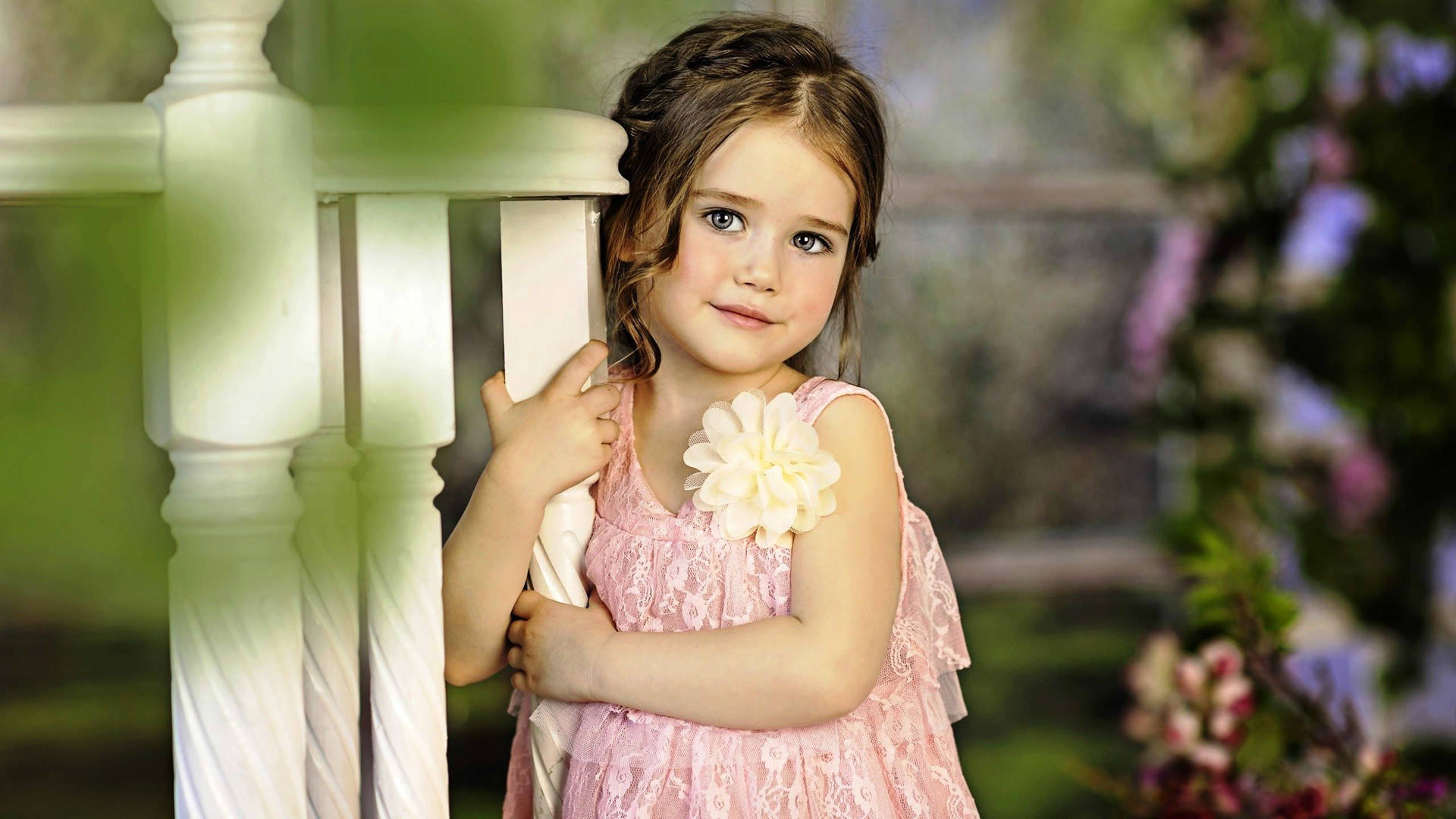 Cute Baby Girl In A Pink Dress Background