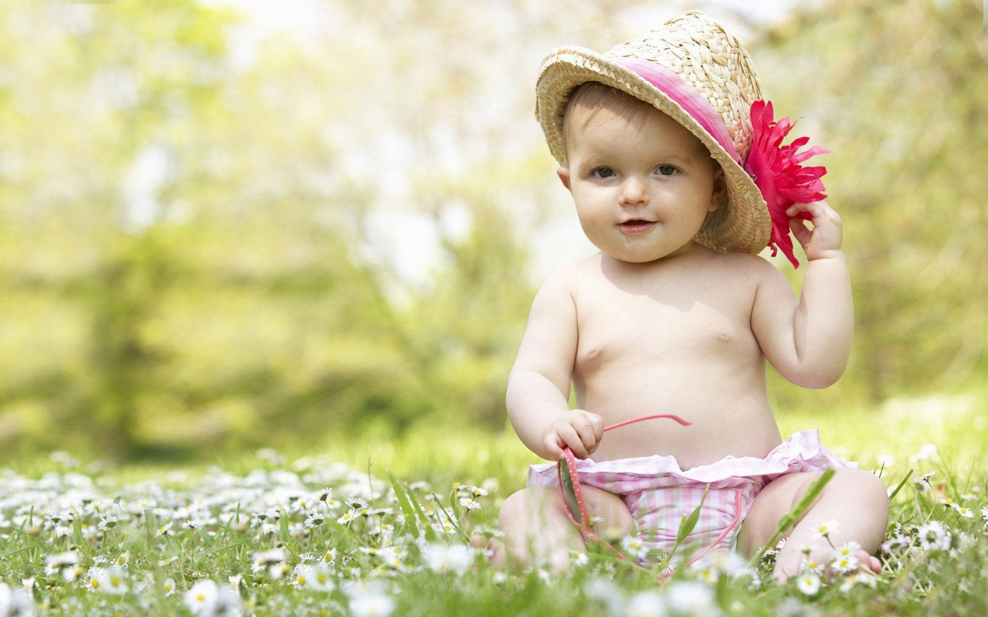 Cute Baby Girl In White Field Background