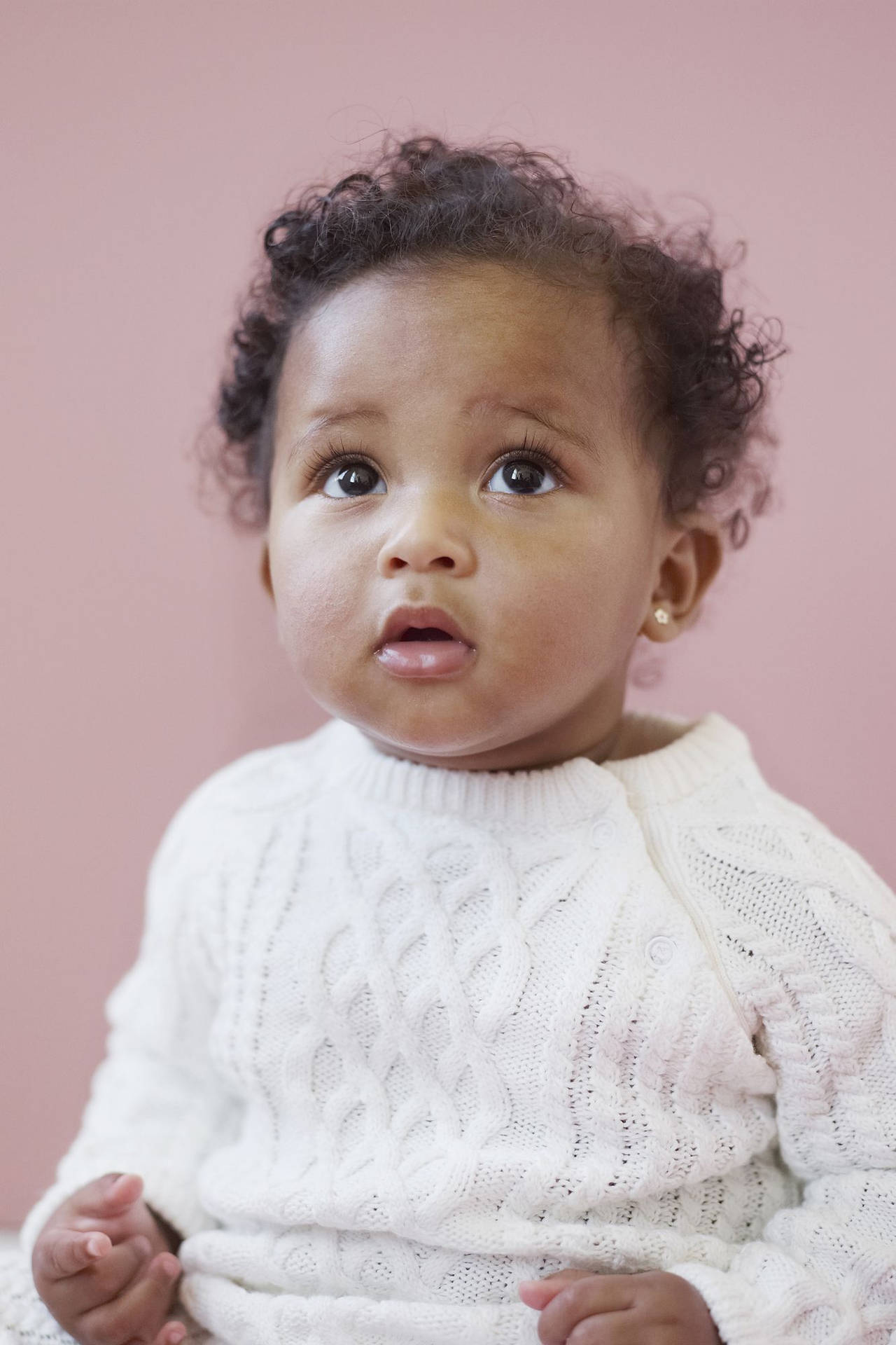 Cute Baby Girl Looking Up Background