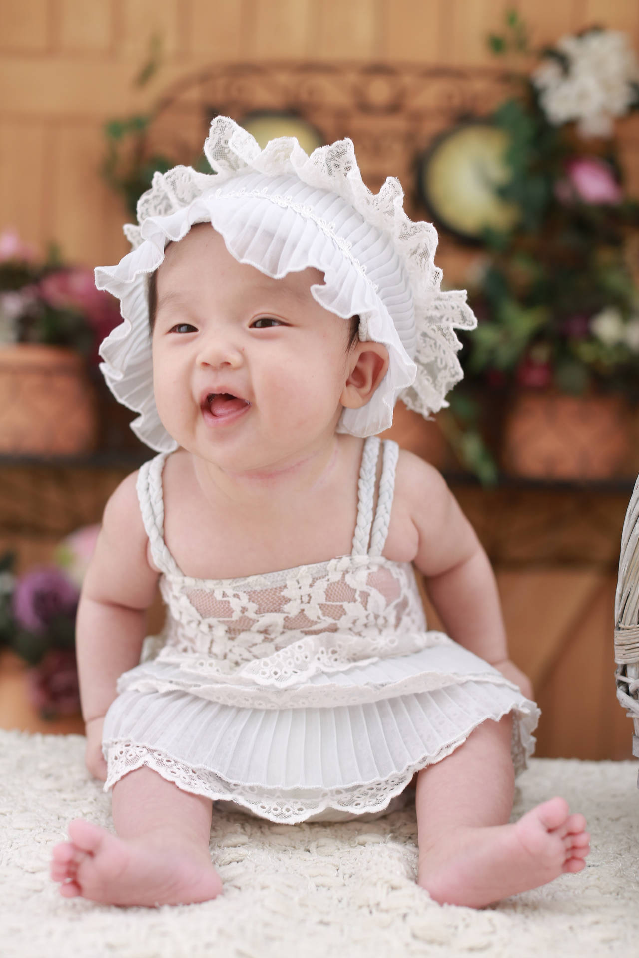 Cute Baby In White Dress And Hairband