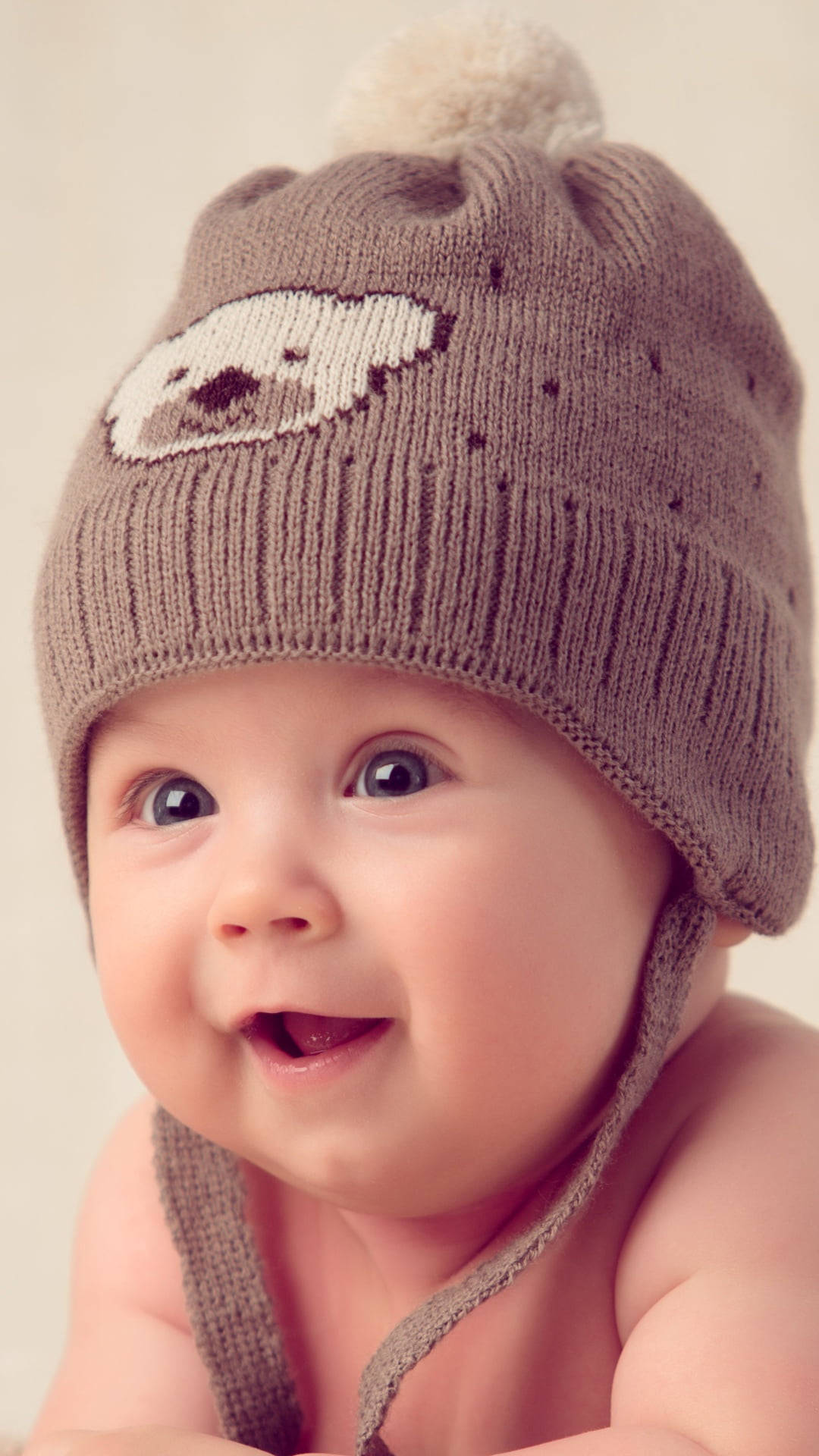 Cute Baby With A Bonnet Background