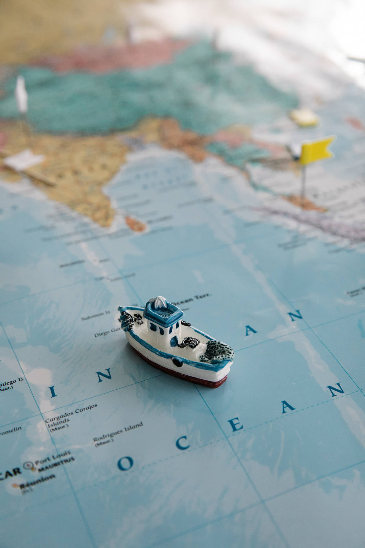 Cute Blue Boat On Map Background