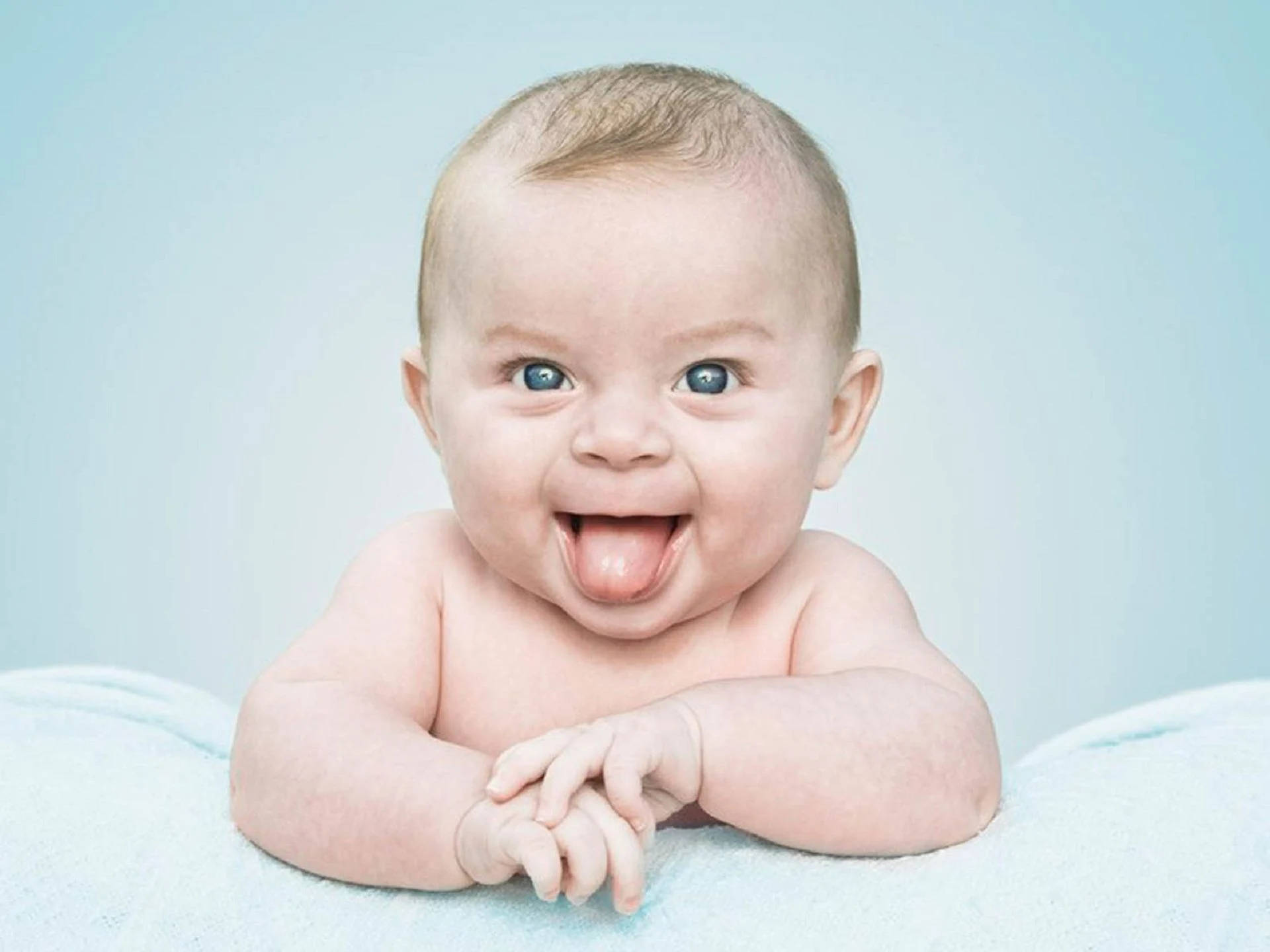 Cute Blue-eyed Funny Baby Background