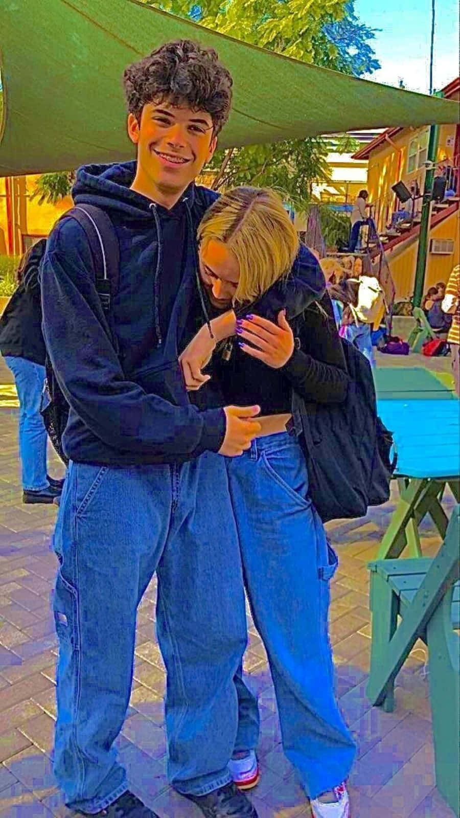 Cute Boyfriend Sharing A Heartfelt Moment With His Girlfriend Background