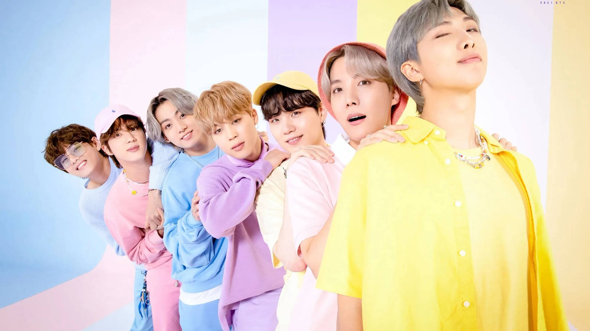 Cute Bts Group Lined Up In Pastel Colors Background