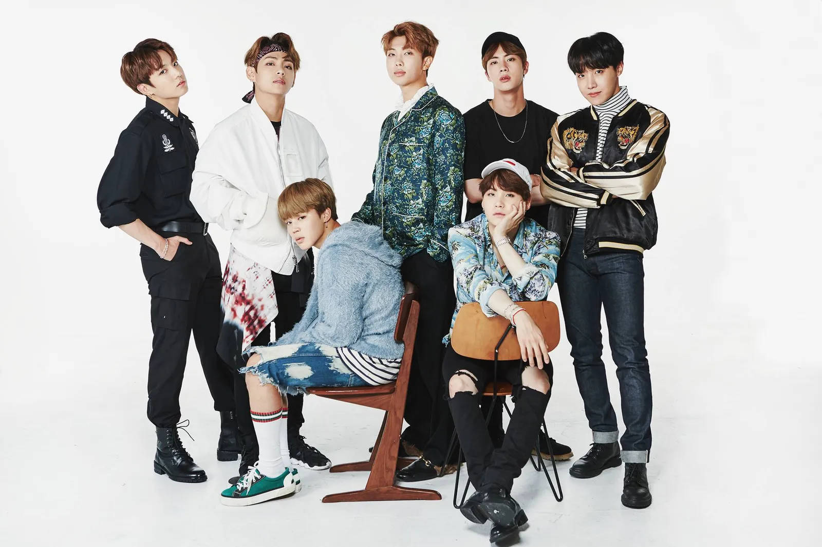 Cute Bts Group Posing Together On White Backdrop Background