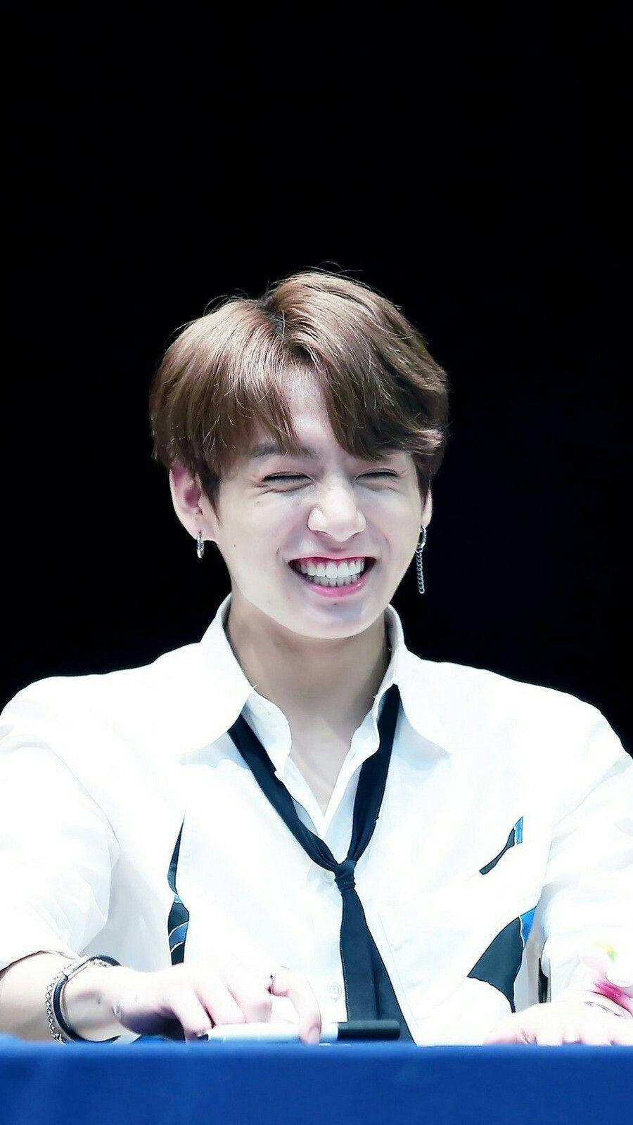 Cute Bts Jungkook Smiling At Fanmeet Background