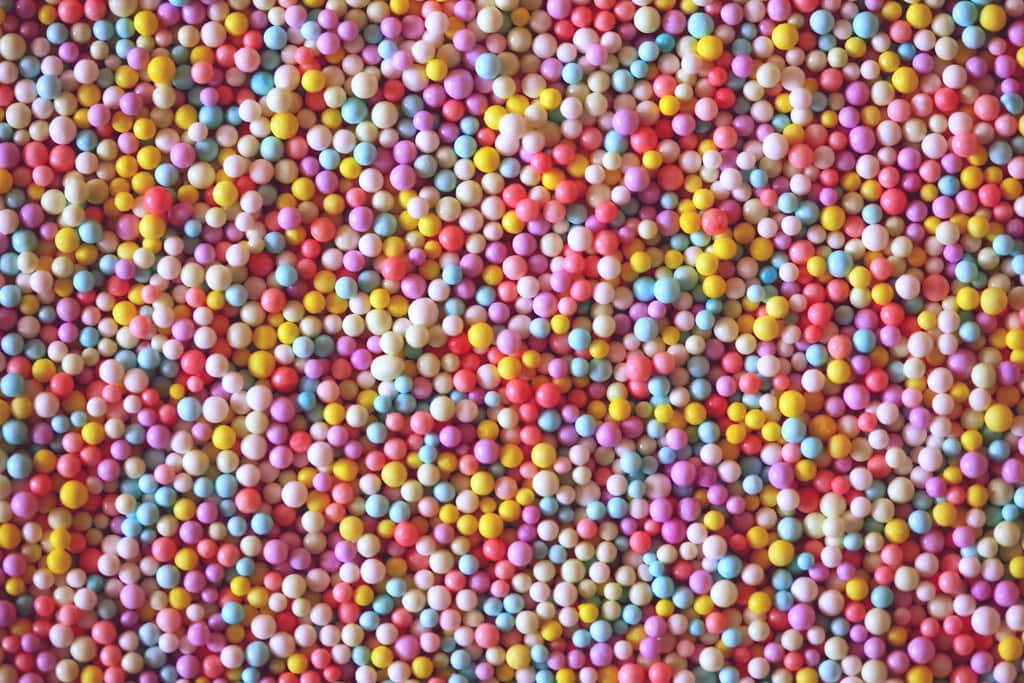 Cute Candy Balls Piled Together Background