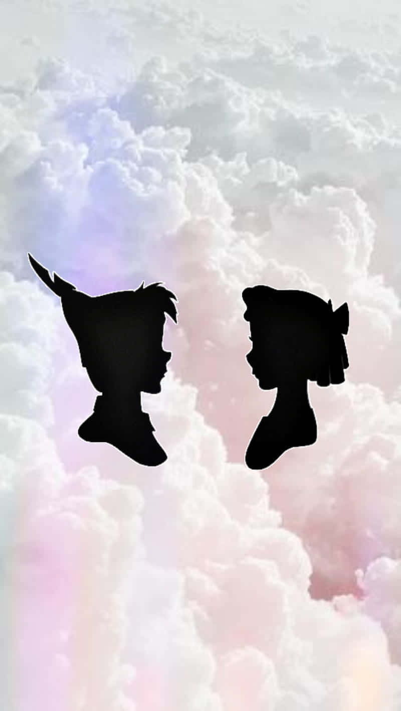 Cute Cloud Silhouettes Of Peter Pan And Wendy Background