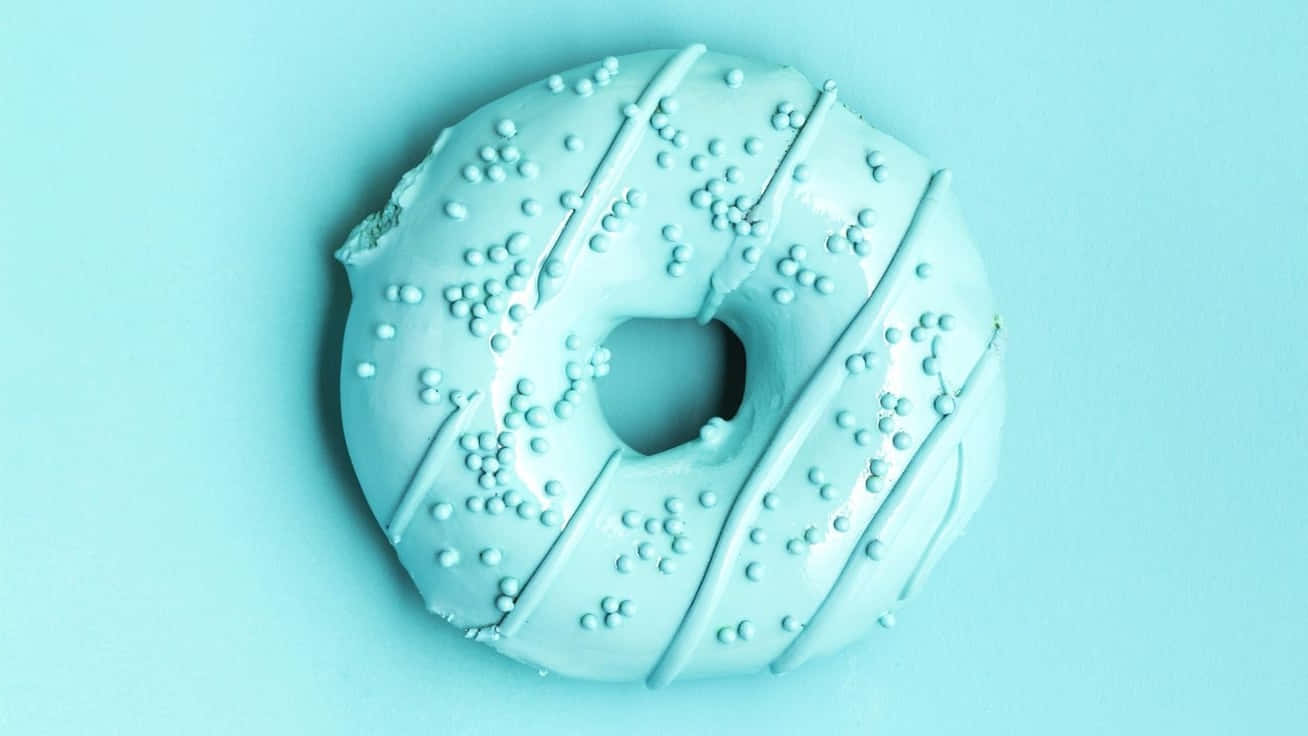 Cute Donut In Teal Aesthetic Laptop Background