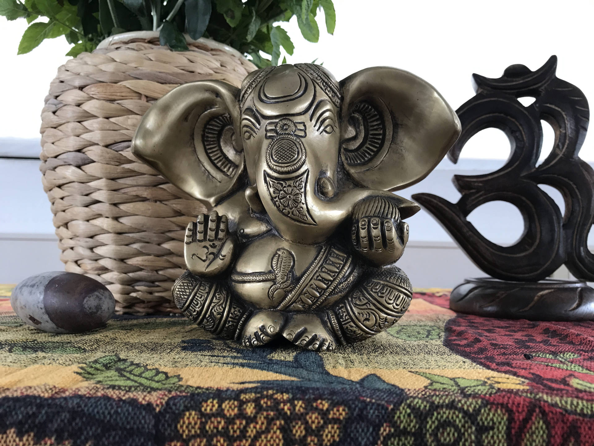 Cute Ganesha Metal Statue Background