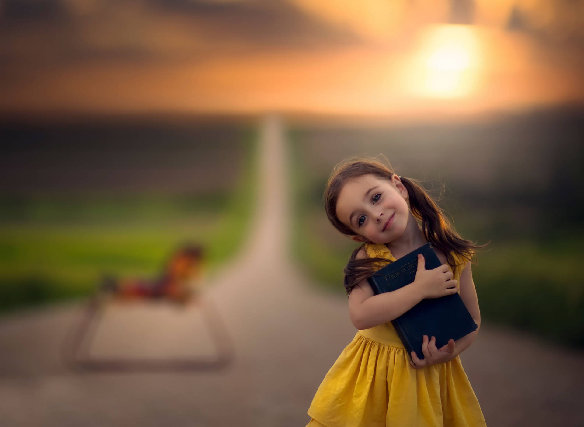 Cute Girl Child Holding A Book