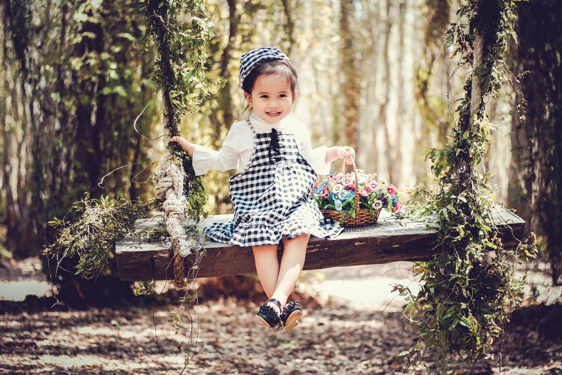 Cute Girl In Forest Wooden Swing