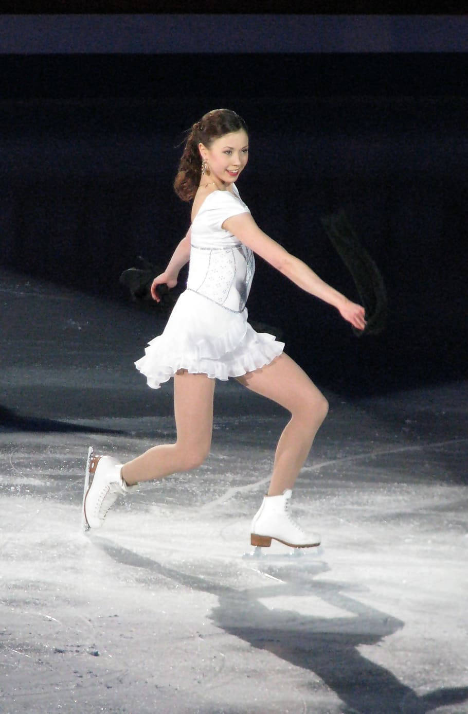 Cute Girl In Ice Skating Tournament Background