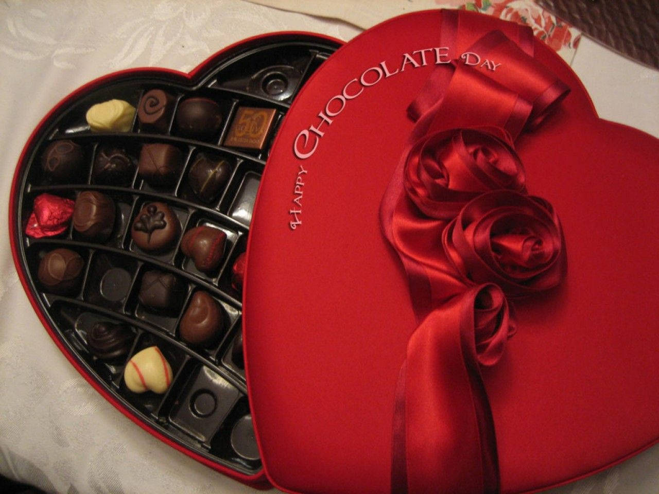 Cute Heart Box With Valentine's Day Chocolates Background