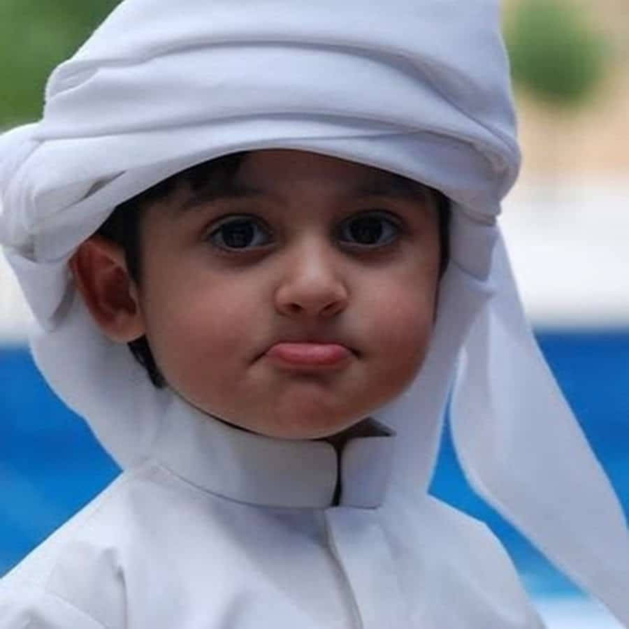 Cute Islamic Boy Pouty Lips Background