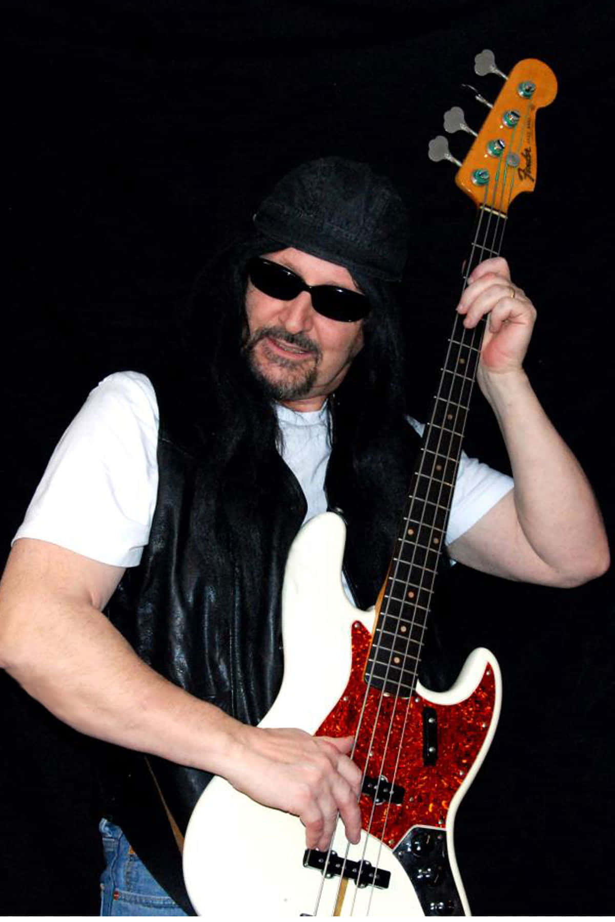 Cute Marc Mero Holdin Guitar Background