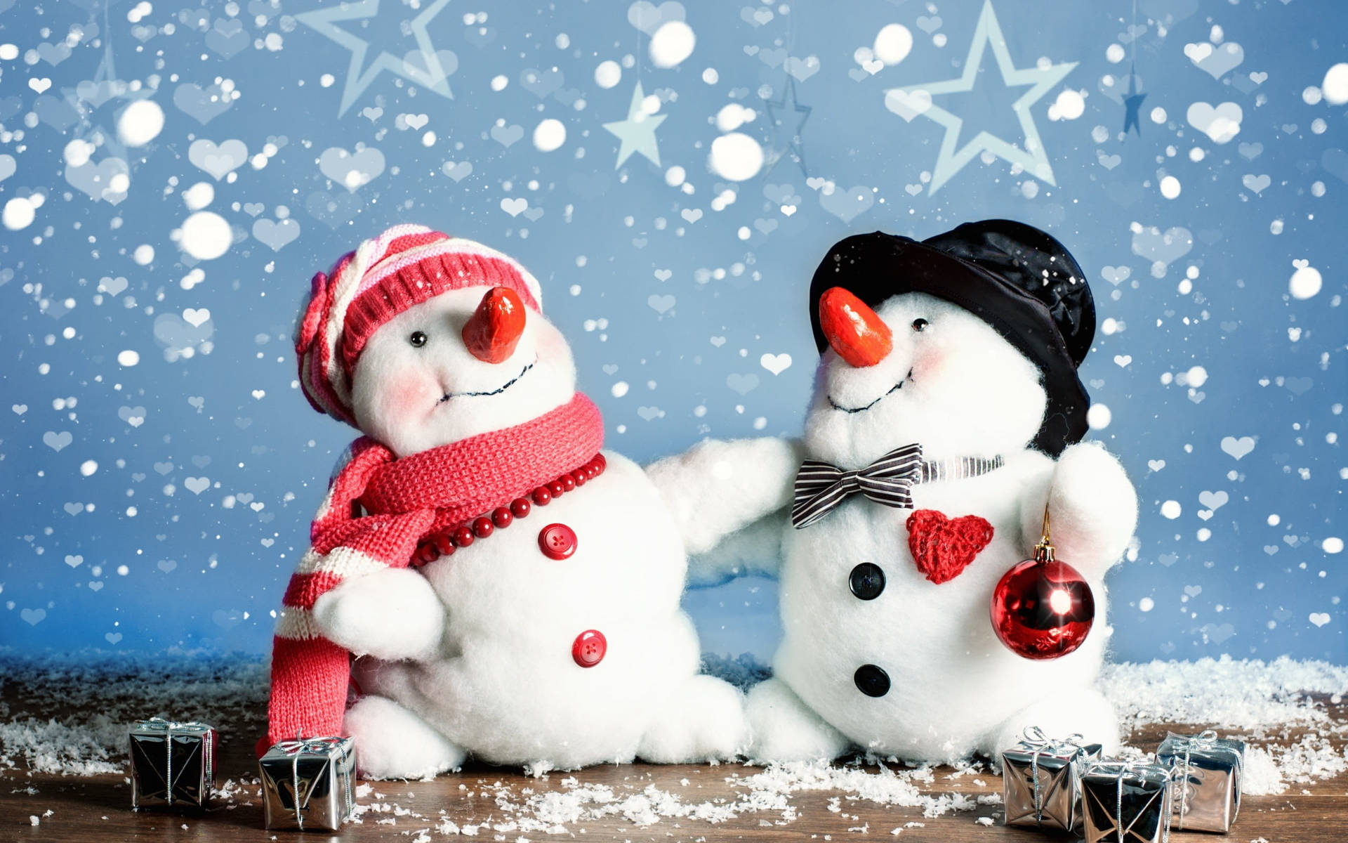 Cute Merry Christmas Snowmen On Table Background