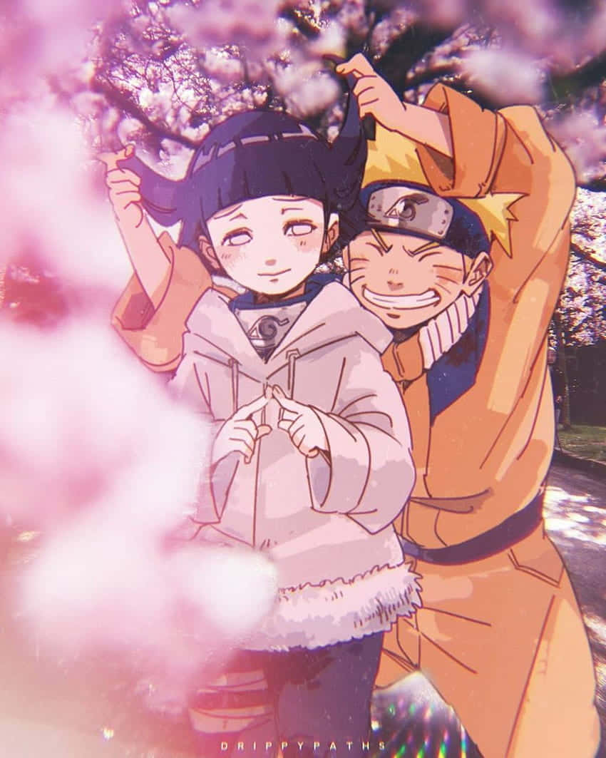 Cute Naruto And Hinata At Cherry Blossoms Park Background