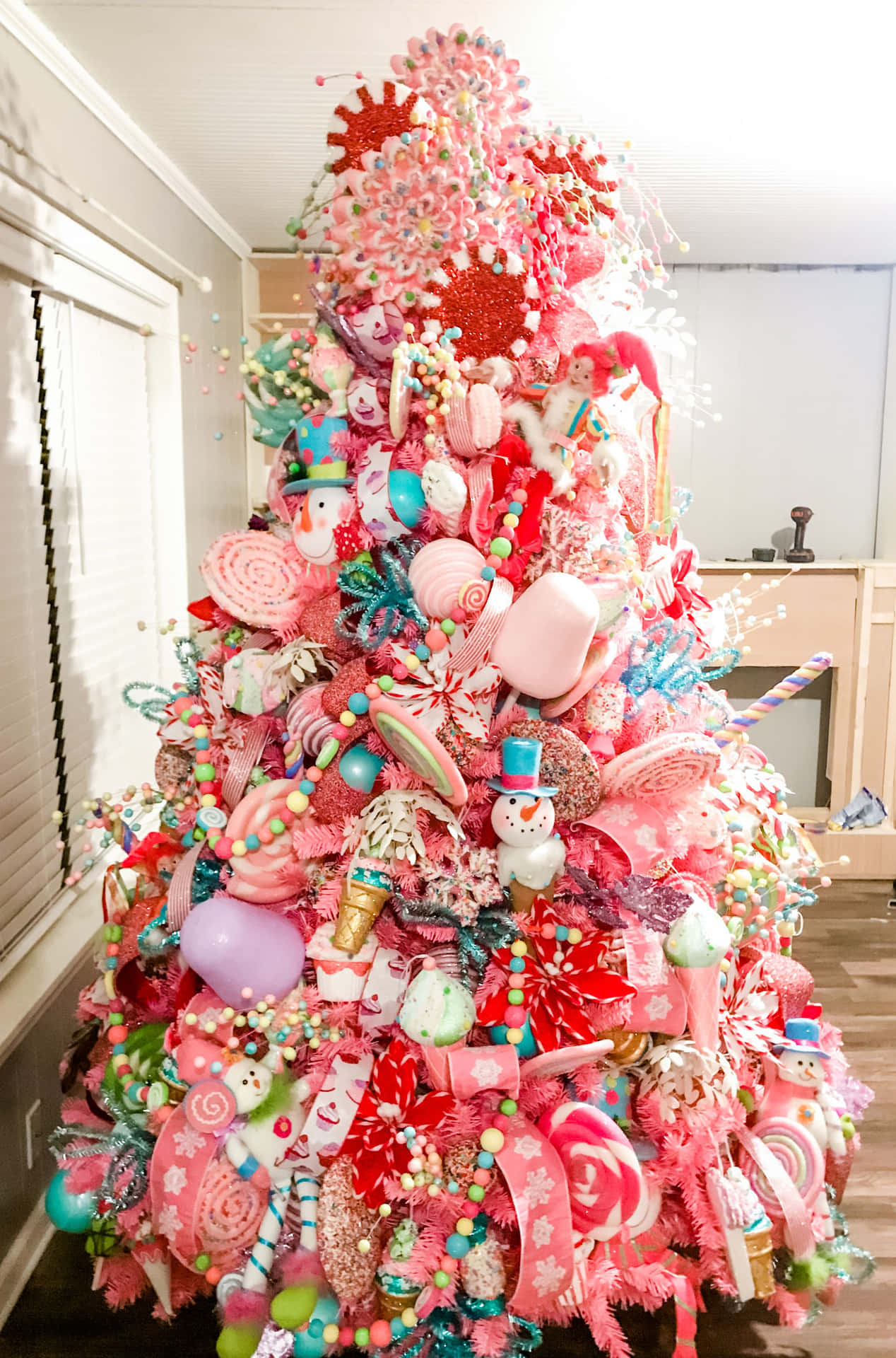 Cute Pink Christmas Tree With Sweet Decoration Background