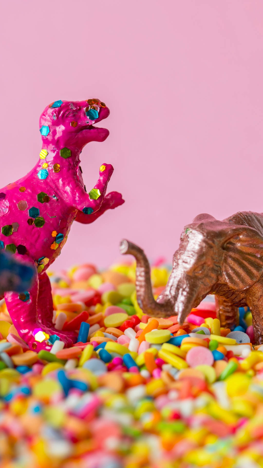 Cute Pink Dinosaur Fun On Sprinkles Background
