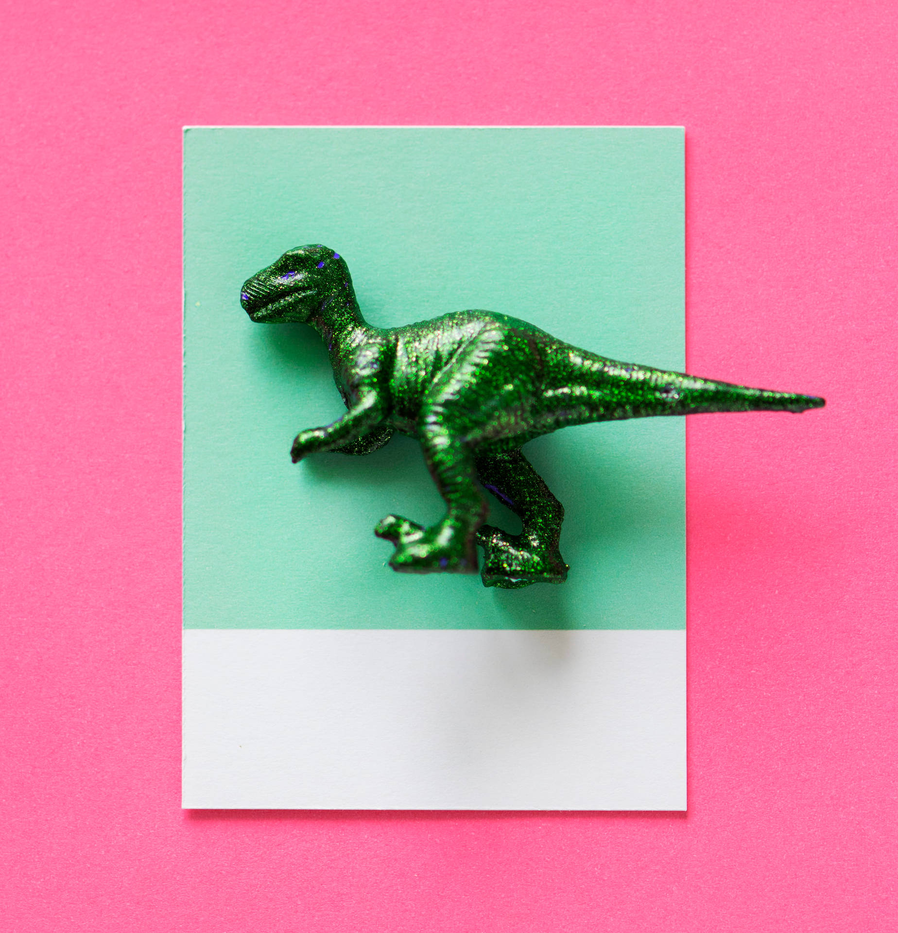 Cute Pink Dinosaur On Mint Paper Background