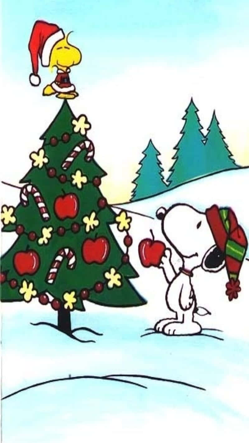 Cute Snoopy Christmas Decorating Tree With Woodstock Background