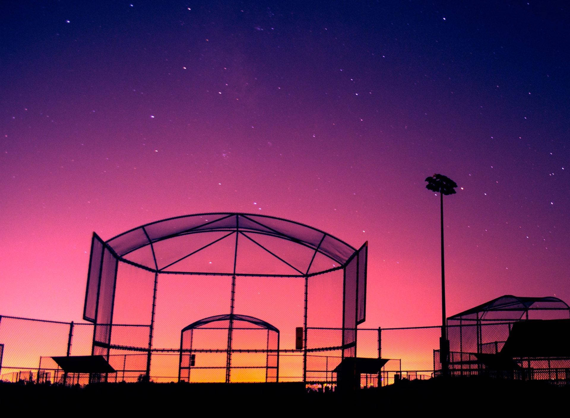 Cute Softball Court Purple Sunset Background