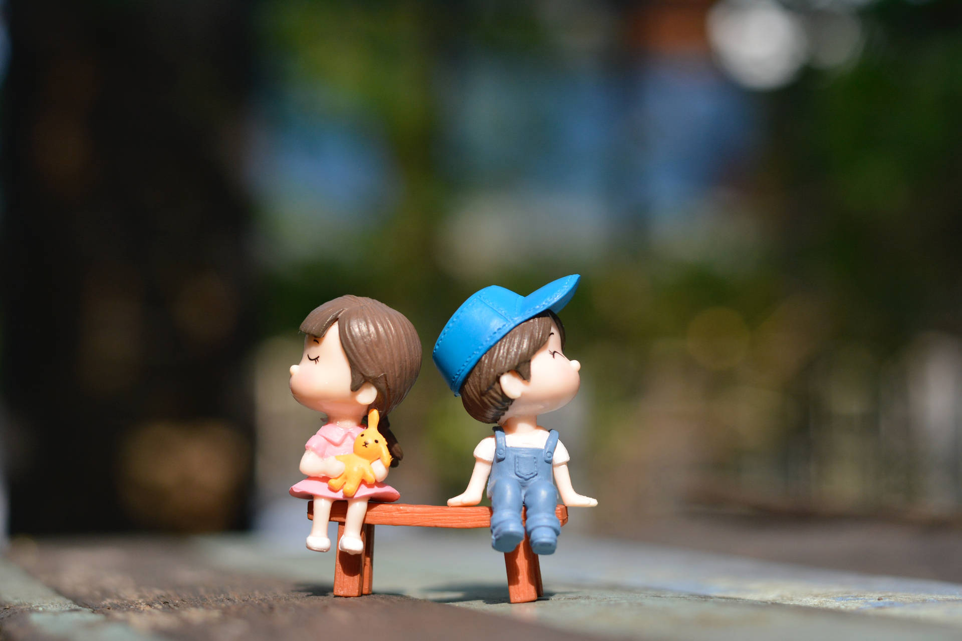 Cute Tablet Couple Figurine Background