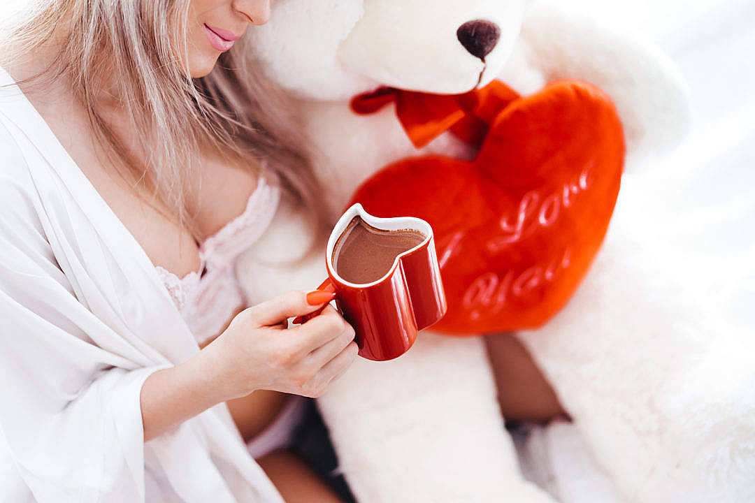 Cute Teddy Bear And A Cup Background
