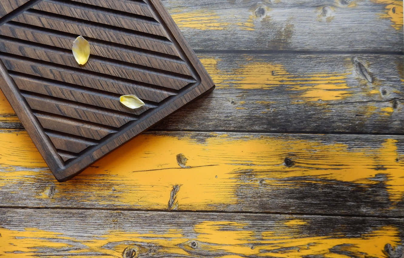 Cutting Board Against The Wood Background