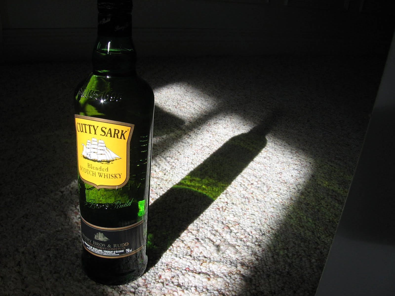 Cutty Sark Whiskey Bottle Window Shadow