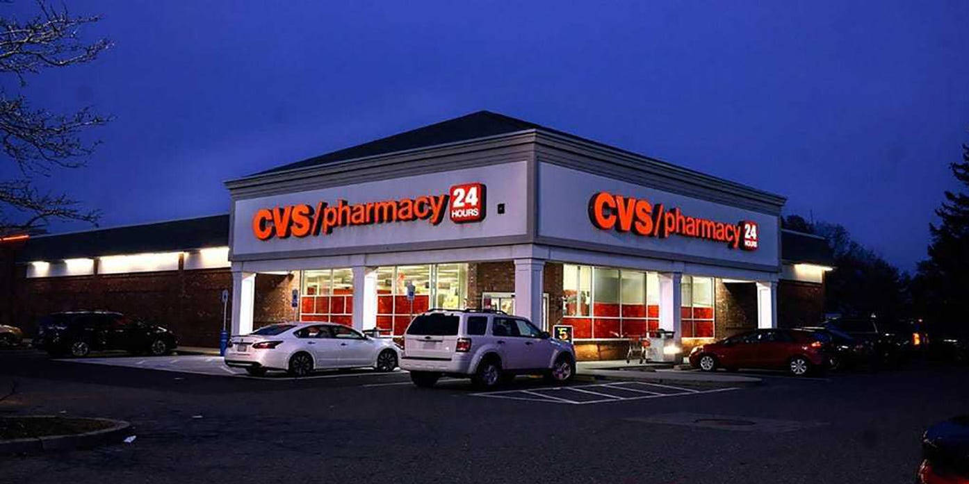 Cvs Pharmacy At Night Background