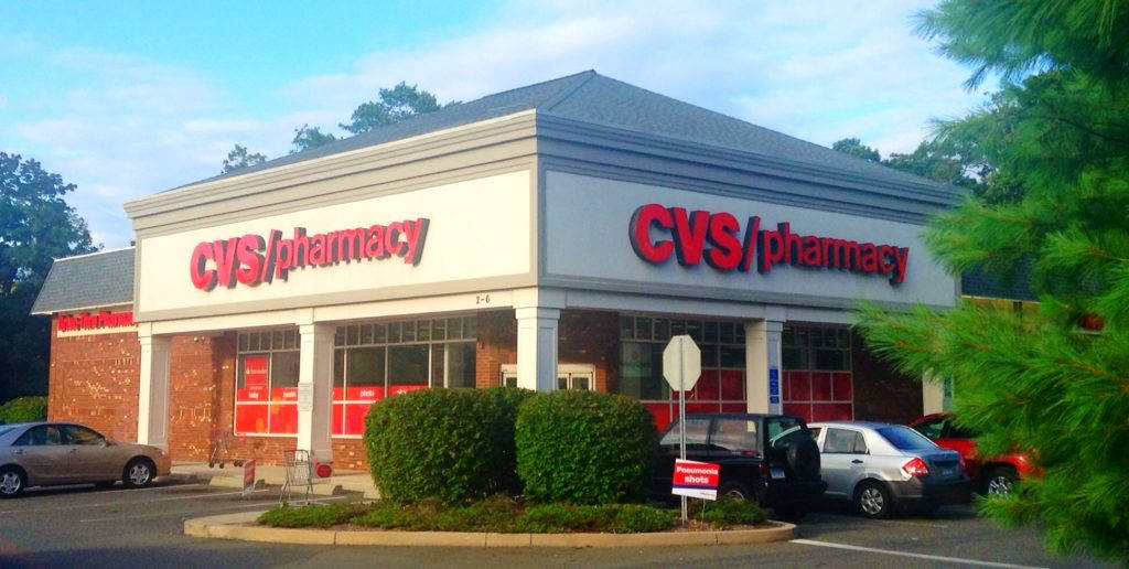 Cvs Pharmacy With Green Trees Background