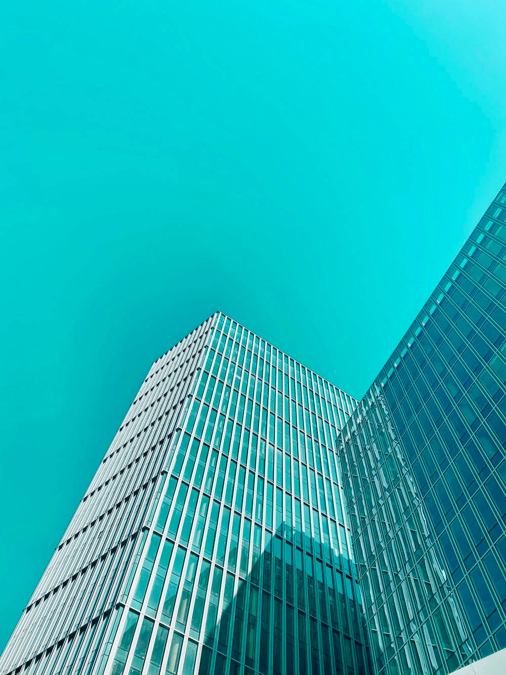 Cyan Sky And Building Background