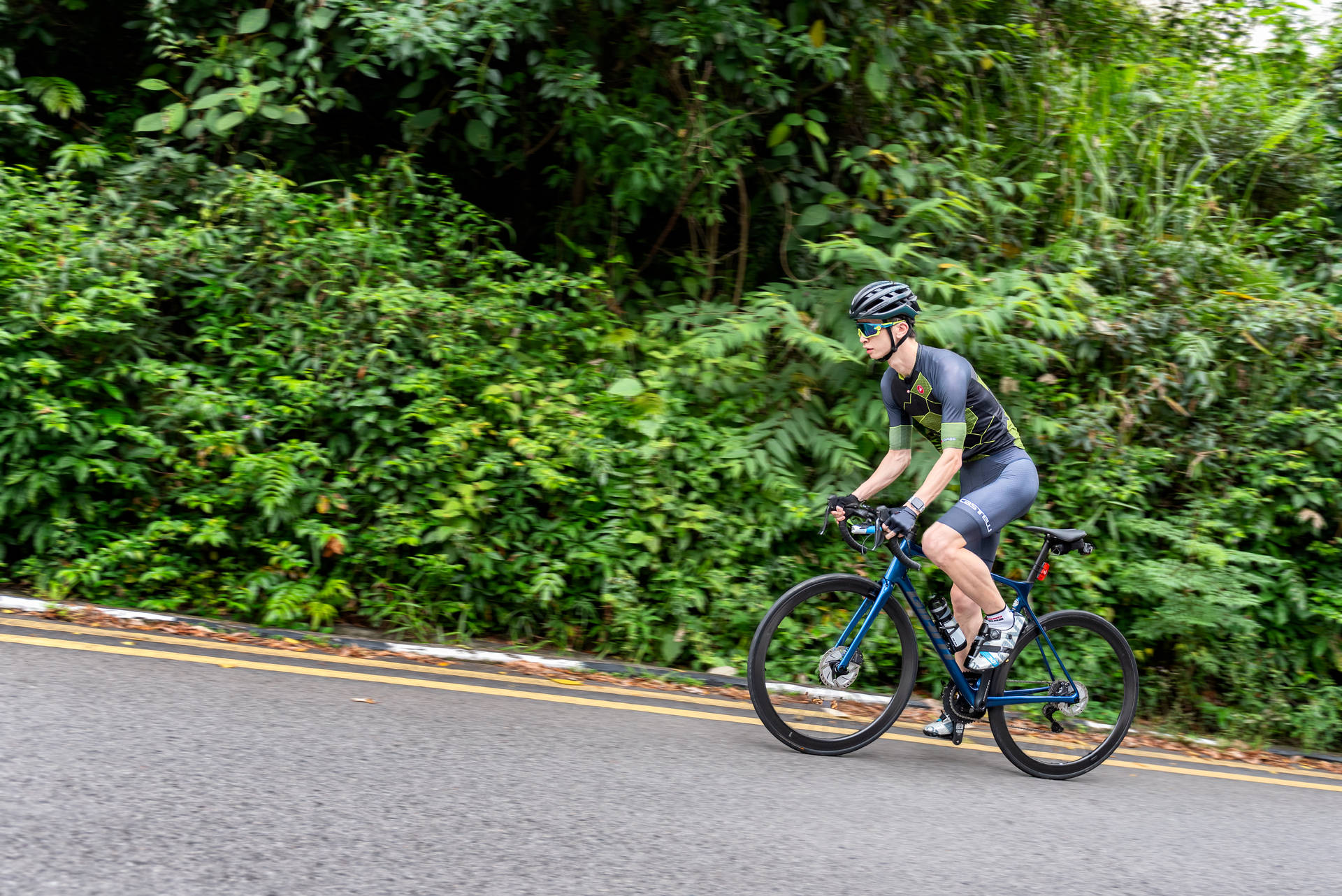 Cycling On Uphill Country Road