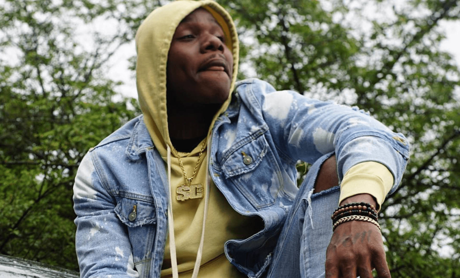 Dababy In Denim Outfit Background