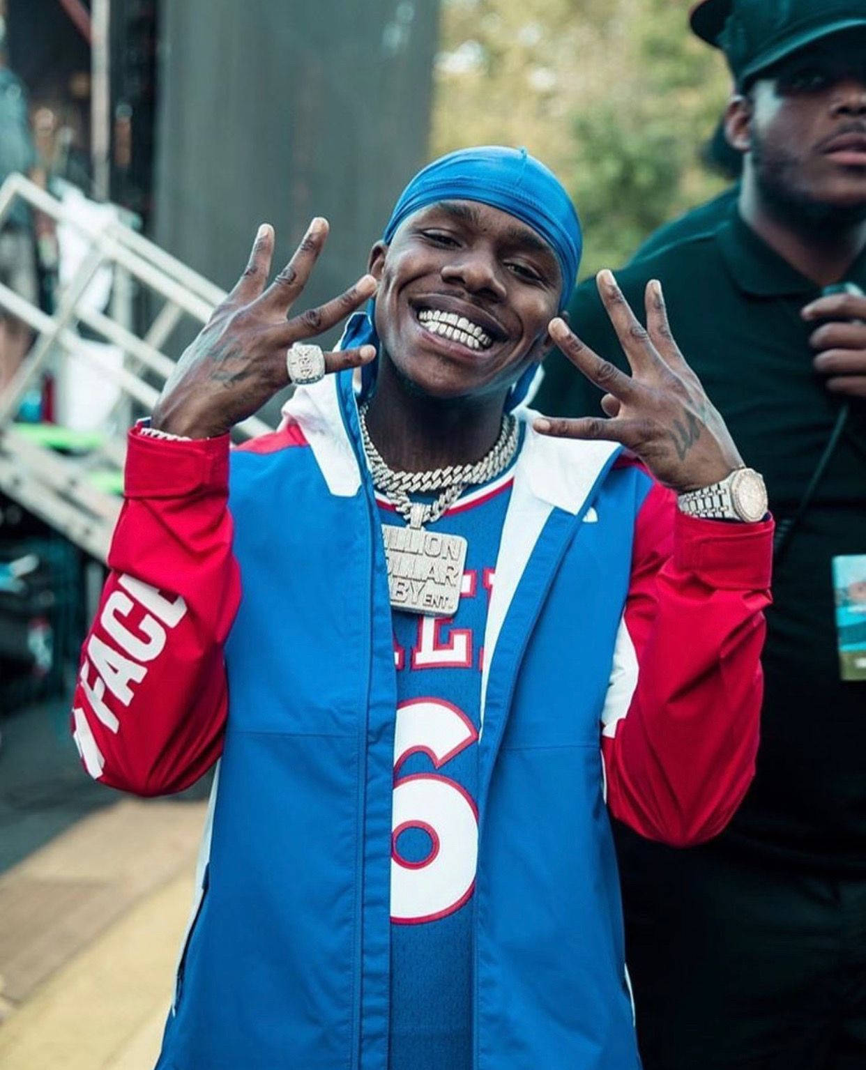 Dababy Phone With Blue Jacket Background