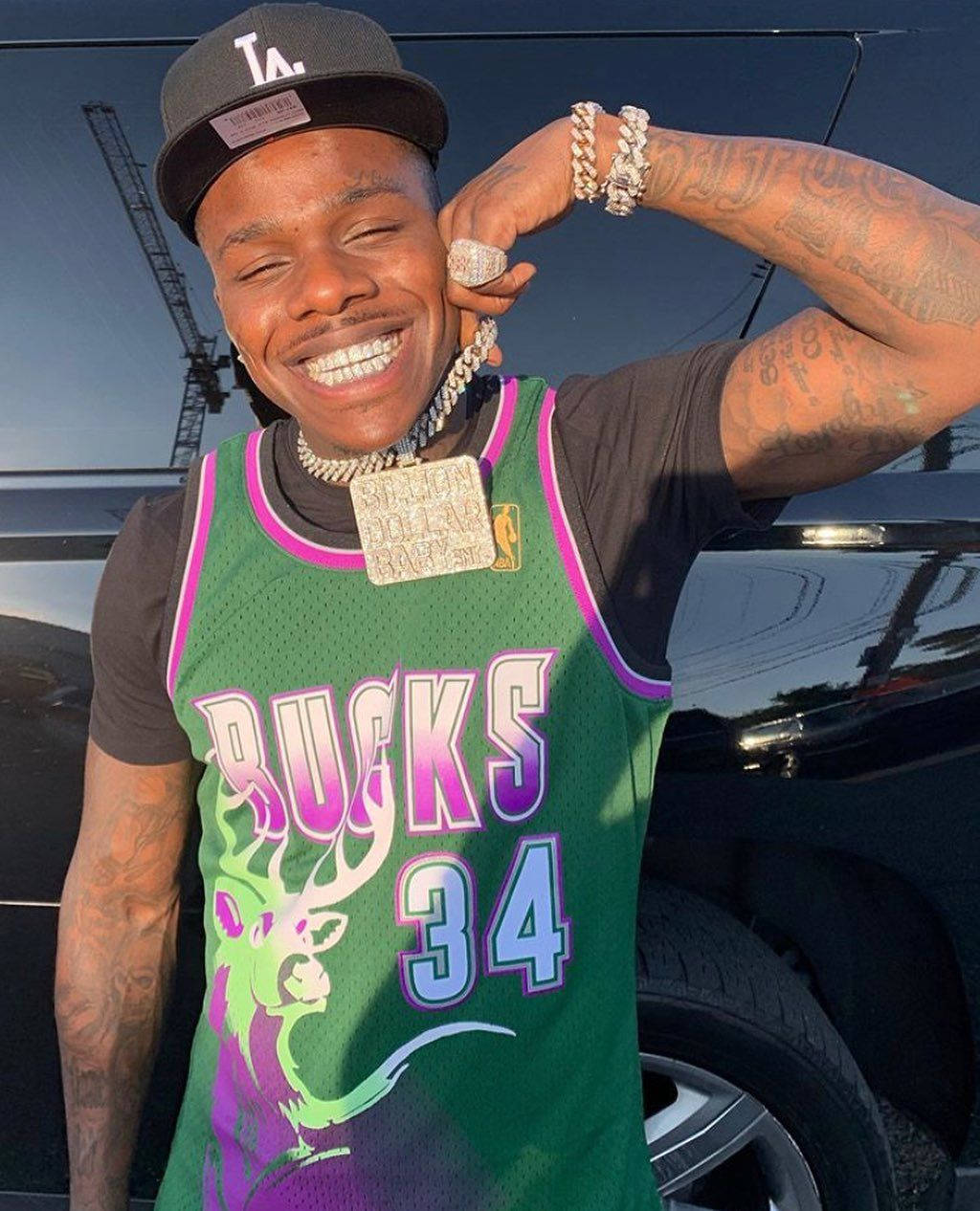 Dababy Phone With Green Basketball Jersey Background