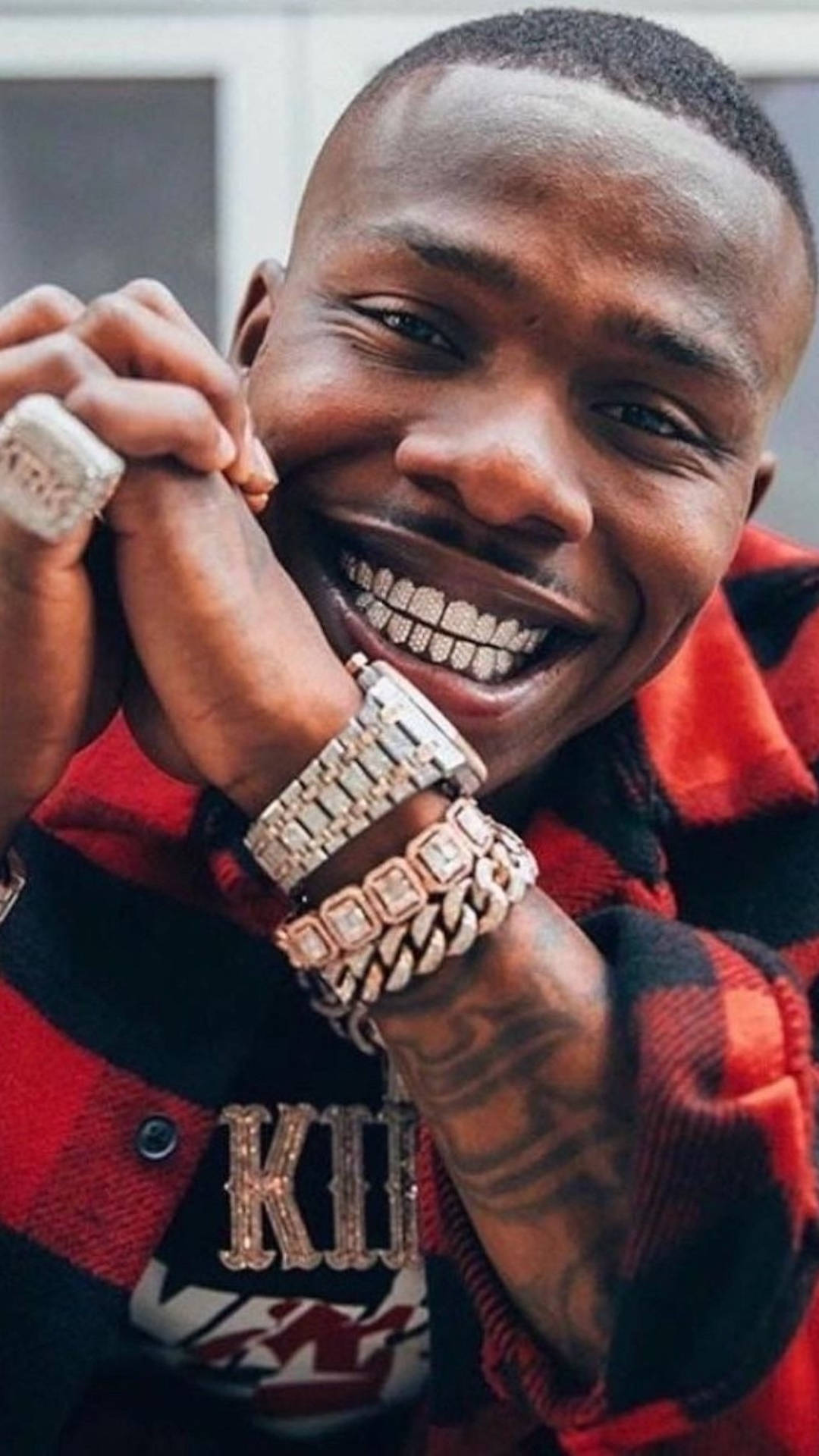 Dababy Phone With Luxurious Accessories Background