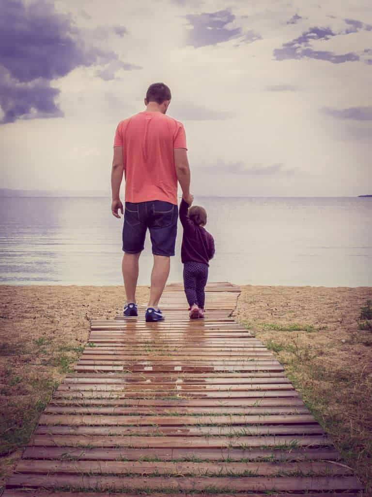 Dad And Child Strolling
