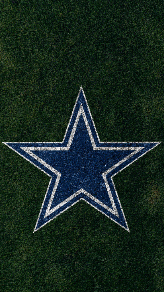 Dallas Cowboys Logo In Grass For Phones Background