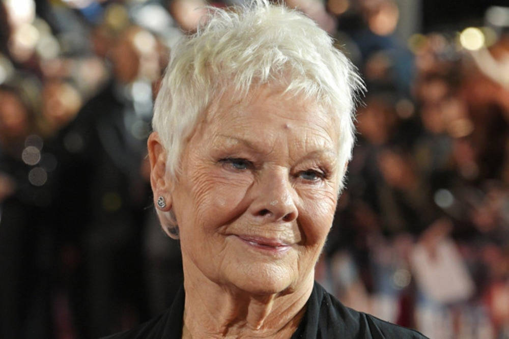 Dame Judi Dench Sporting Her Signature Short Haircut Background