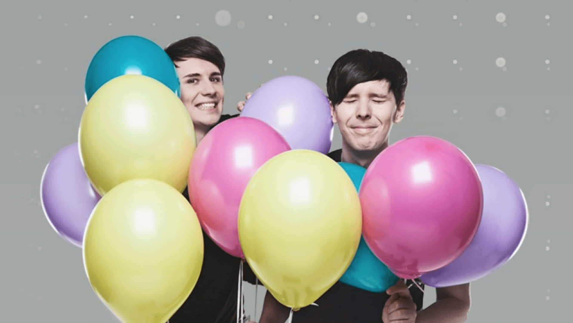 Dan And Phil Enjoying A Night Out Background