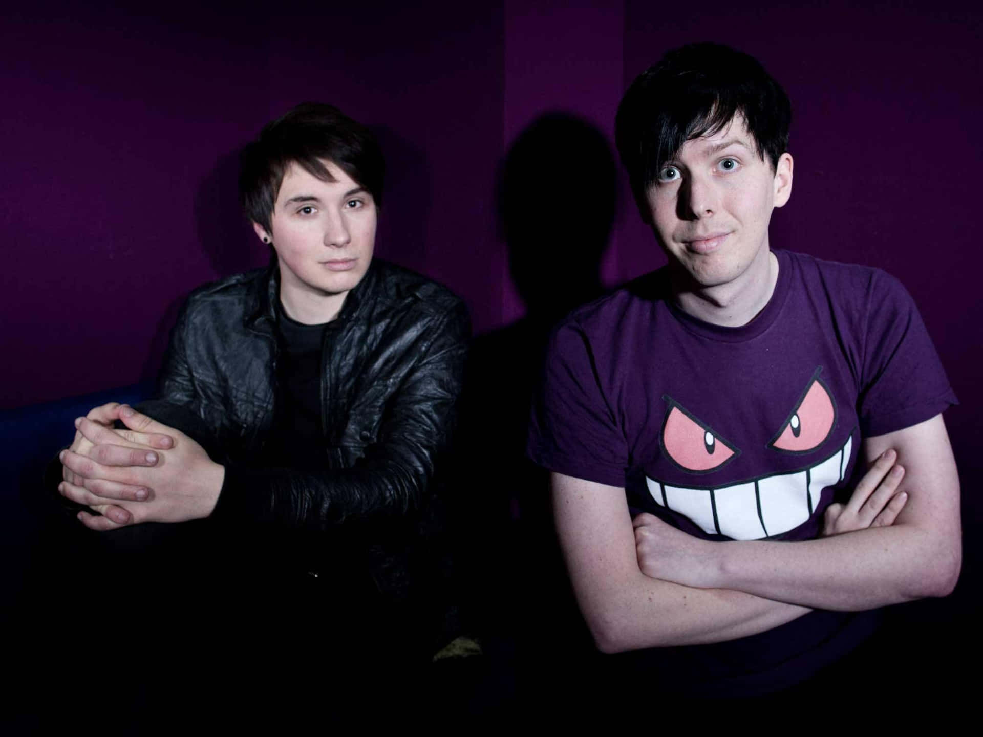 Dan And Phil Having A Laugh Together Background